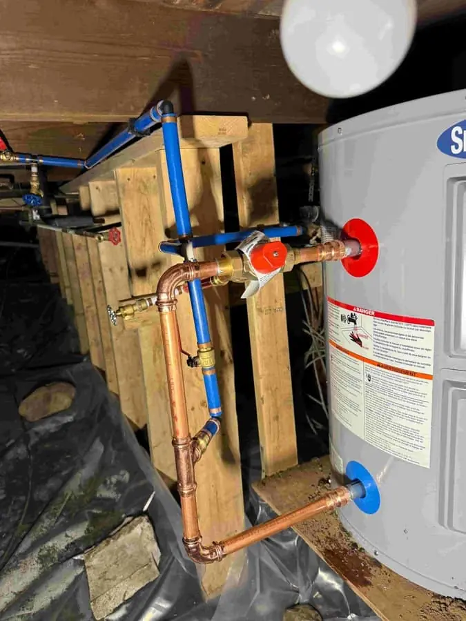 Newly installed water heater tank with fresh supply and vent connections — Quick Plumbing & Drain, serving Nobleton, ON